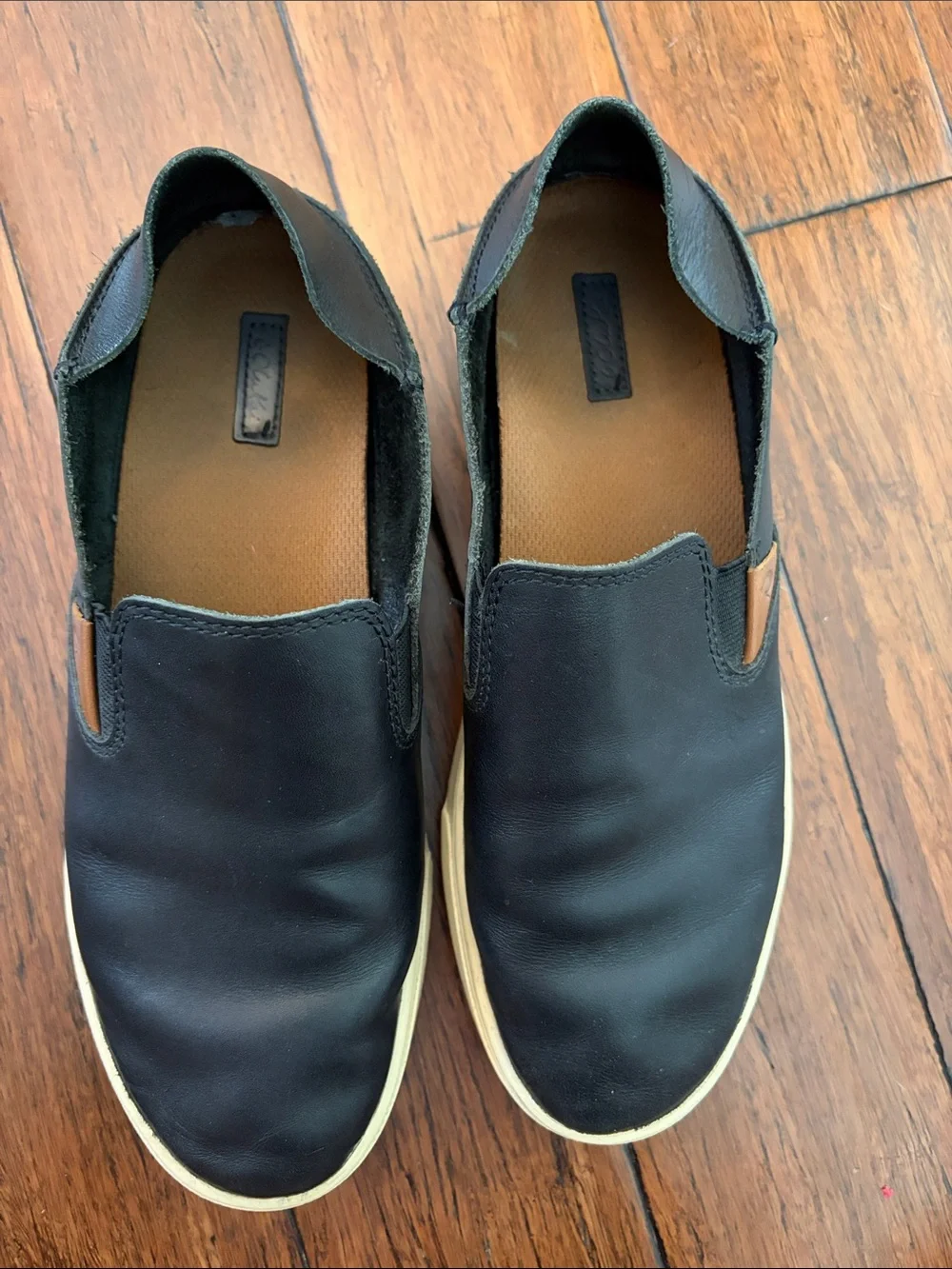 Olukai Women’s Slip-On Leather Sneakers - Black - Picture 5 of 6